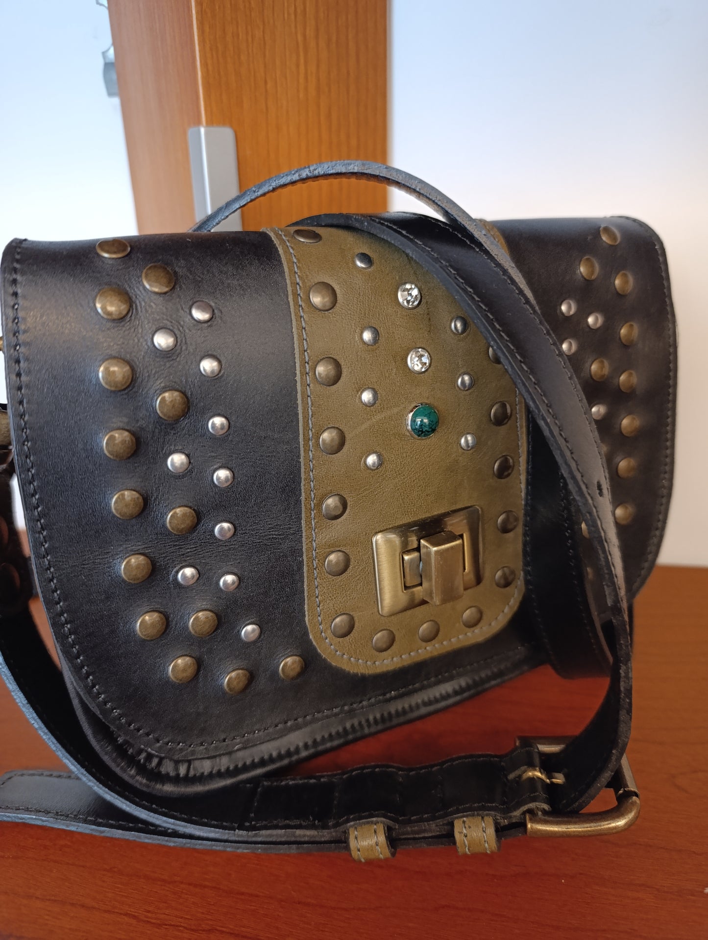Borsa in pelle by Fabrizio Marchionni.